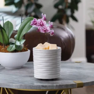 Harmony Spa wax warmer in a living room setting, gently warming wax to create a relaxing fragrance