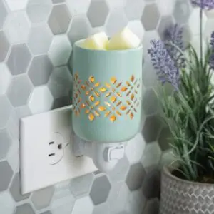 Harmony Spa plug-in wax warmer in a kitchen, gently warming wax to release fragrance