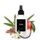 Mango Champagne Room Spray featuring mango, tangerine, papaya, coconut, grapefruit, sandalwood, and musk notes.